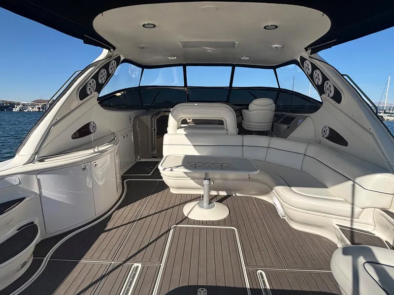 Slide: The Image of 1999 Sea Ray 540 Sundancer yacht interior with luxurious seating and modern design. - 10