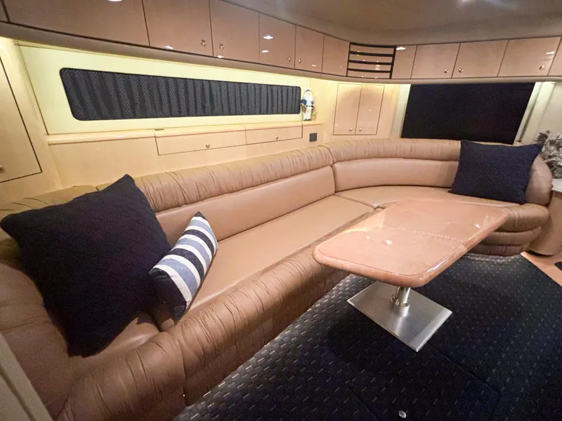 Slide: The Image of Luxurious 1999 Sea Ray 540 Sundancer yacht interior with plush seating and elegant design. - 32