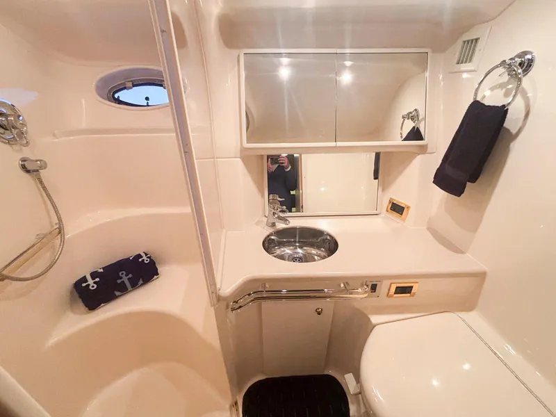 Slide: The Image of Luxurious bathroom in 1999 Sea Ray 540 Sundancer yacht with modern fixtures. - 38