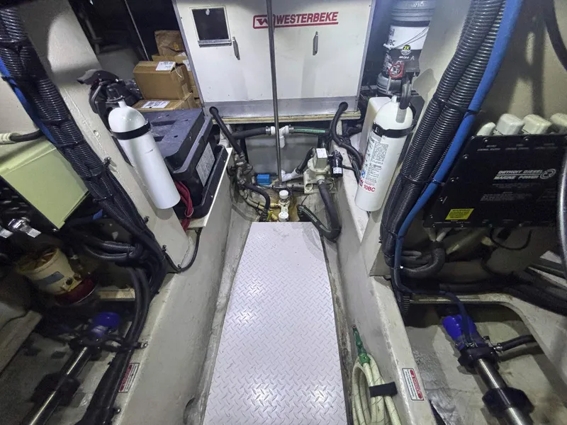 Slide: The Image of Engine room of 1999 Sea Ray 540 Sundancer with Westerbeke generator and equipment. - 45