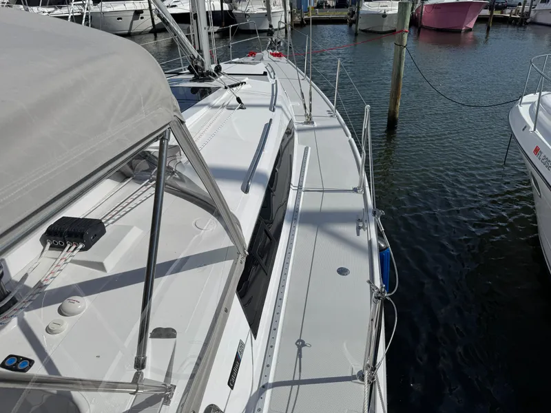 Slide: The Image of Modern Catalina 426 sailboat docked at marina, showcasing sleek deck design, 2025 model. - 23