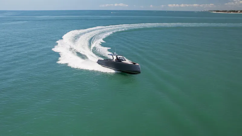Slide: The Image of 2025 Pardo Yachts P43 cruising swiftly on open sea, leaving a dynamic wake. - 16