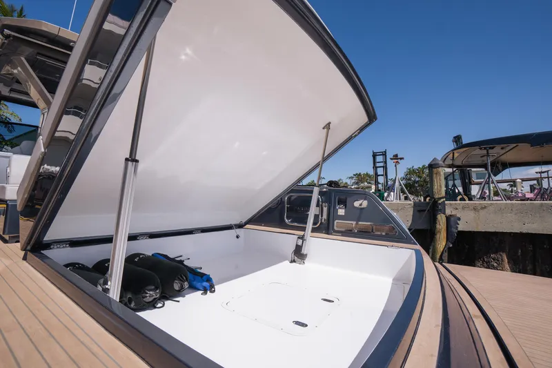 Slide: The Image of 2025 Pardo Yachts P43 open storage compartment on deck, showcasing spacious design. - 21