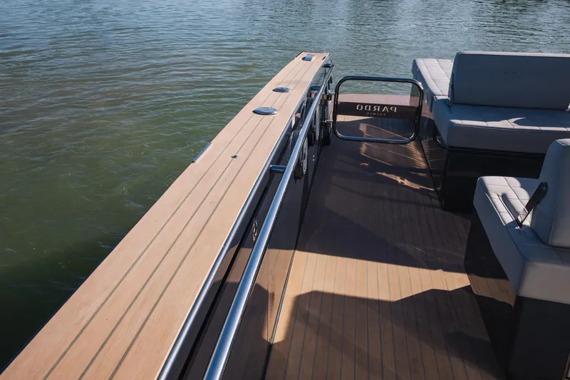 Slide: The Image of 2025 Pardo Yachts P43 deck with seating, sleek design, and water view. - 23
