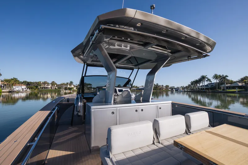 Slide: The Image of 2025 Pardo Yachts P43 luxury yacht with sleek design on a calm waterway. - 27
