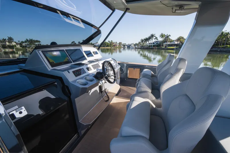 Slide: The Image of Interior of 2025 Pardo Yachts P43, featuring sleek helm and luxurious seating. - 34