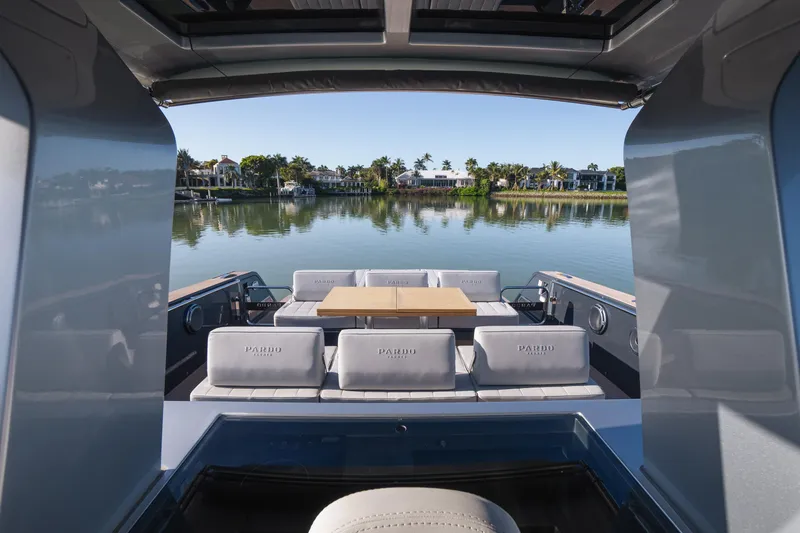Slide: The Image of 2025 Pardo Yachts P43 interior with elegant seating and scenic waterfront view. - 35