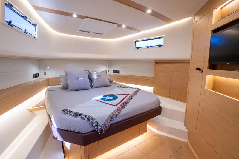 Slide: The Image of Luxurious interior cabin of 2025 Pardo Yachts P43, featuring modern design and ambient lighting. - 37