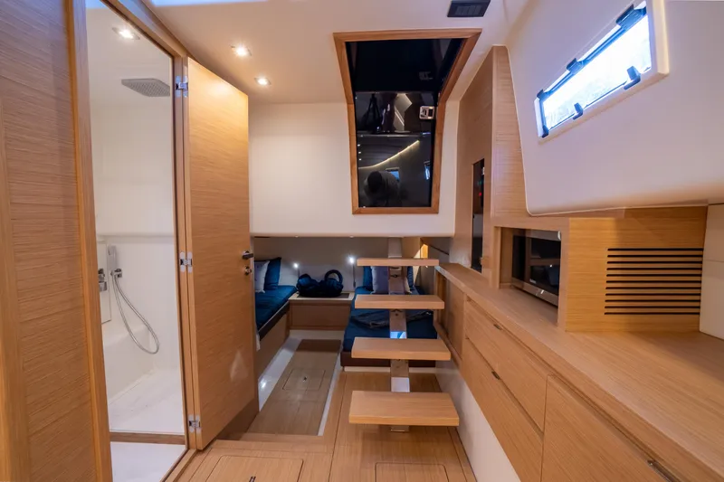 Slide: The Image of Luxurious interior of 2025 Pardo Yachts P43, featuring modern wood finishes and elegant design. - 39