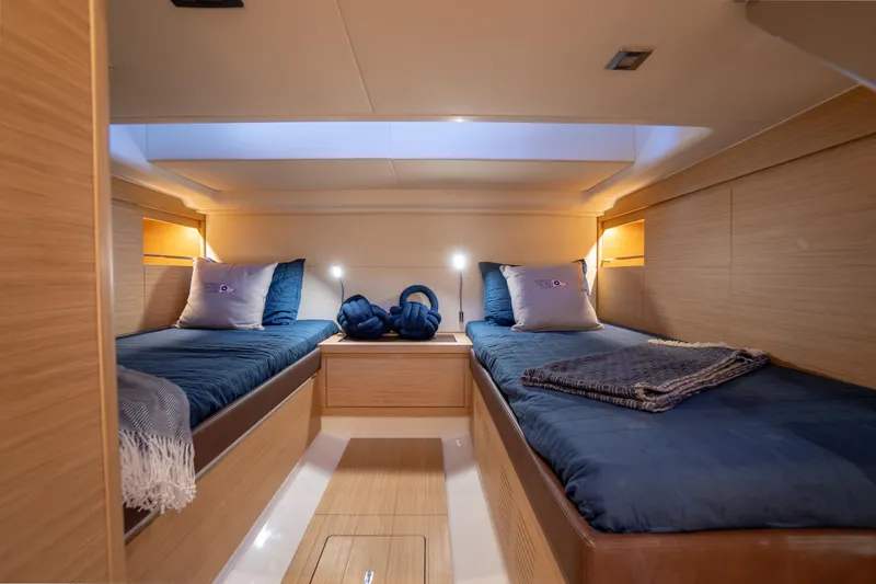 Slide: The Image of Luxurious cabin interior of 2025 Pardo Yachts P43 with twin beds and elegant lighting. - 40