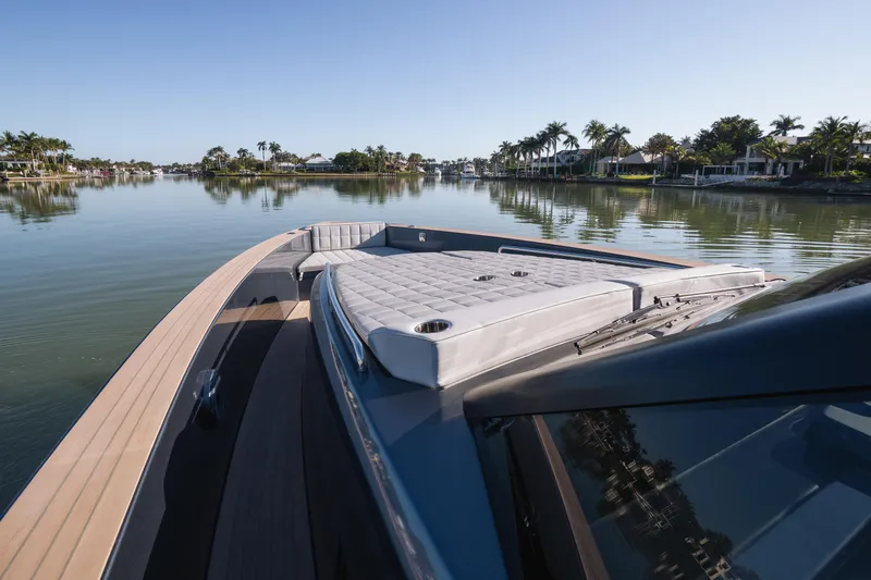 Slide: The Image of 2025 Pardo Yachts P43 on tranquil water, showcasing sleek design and luxurious deck. - 42