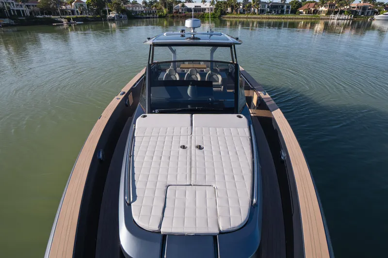 Slide: The Image of 2025 Pardo Yachts P43 luxury yacht on calm water, featuring sleek design and spacious deck. - 43