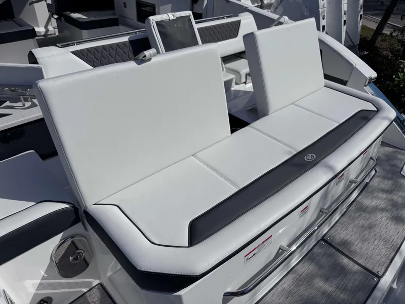 Slide: The Image of Cobalt R35 2025 boat with luxurious white seating and modern design. - 34