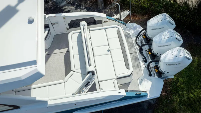 Slide: The Image of 2025 Cobalt R35 boat with triple Mercury outboard engines and spacious seating area. - 4