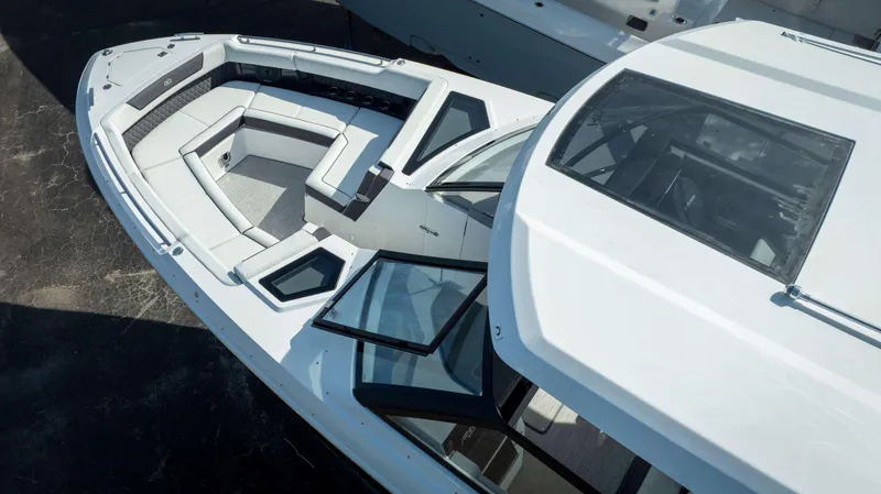 Slide: The Image of 2025 Cobalt R35 boat with spacious seating and sleek design. - 5