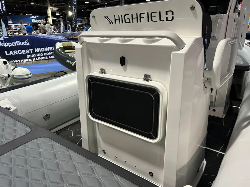 Slide: The Image of 2025 Highfield Sport 560 boat interior at a boat show. - 8