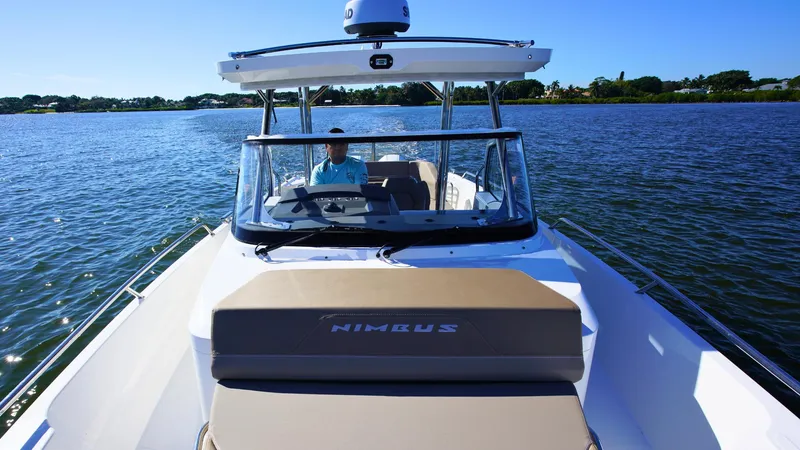 Slide: The Image of Nimbus T9 #165 boat cruising on a sunny day, 2025 model. - 11