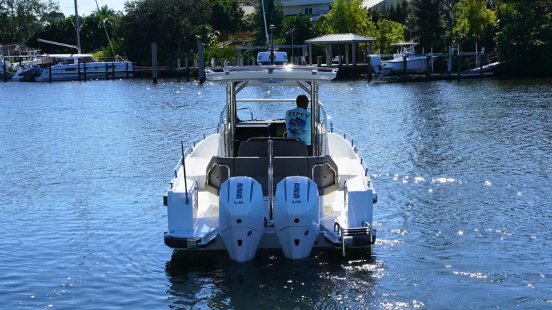Slide: The Image of Nimbus T9 #165 boat on a sunny lake, 2025 model. - 3