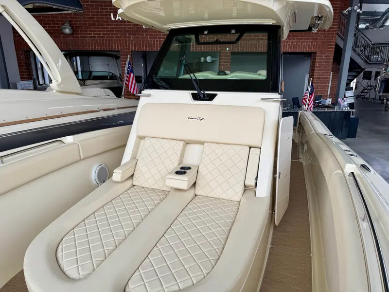 Slide: The Image of 2022 Chris-Craft Catalina 30 boat with luxurious beige seating and elegant design. - 43