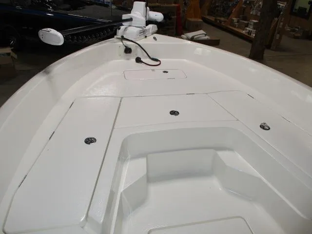 Slide: The Image of 2025 Skeeter SX2350 boat interior with white deck and storage compartments. - 3