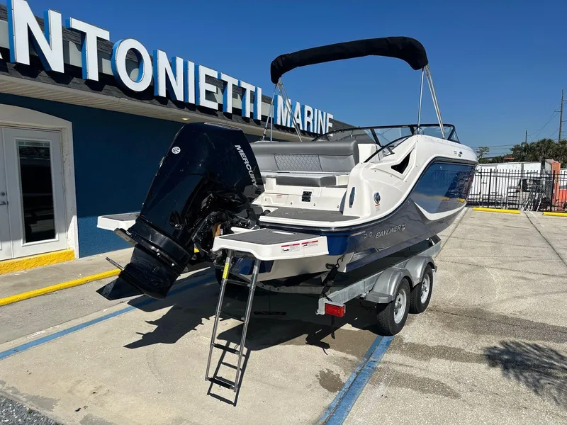 Slide: The Image of 2025 Bayliner D22 boat on trailer at Antonietti Marine dealership. - 4