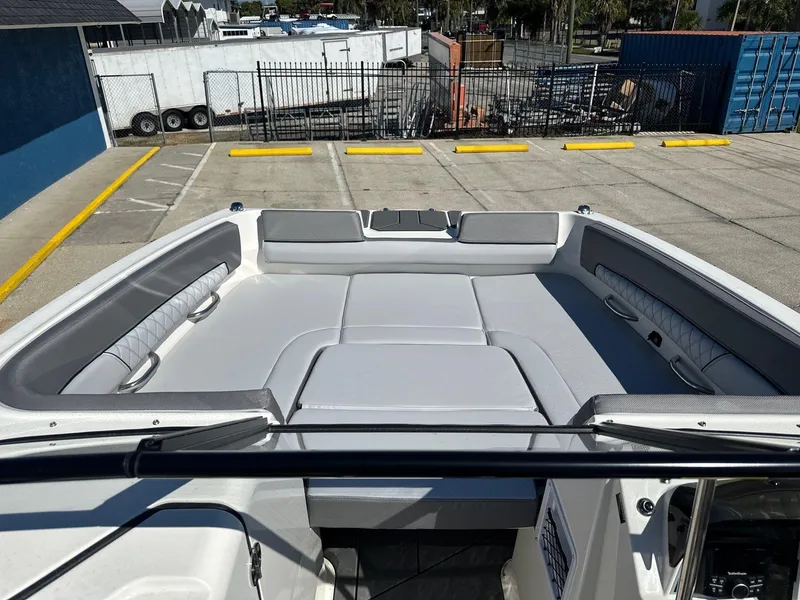 Slide: The Image of 2025 Bayliner D22 boat interior with spacious seating and modern design. - 6