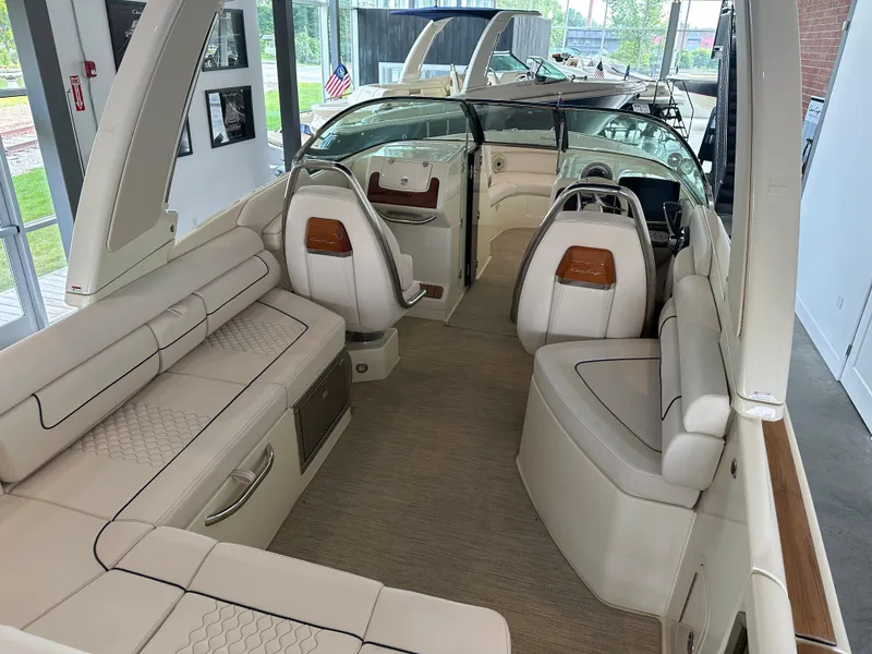 Slide: The Image of 2024 Chris-Craft Launch 28 GT interior with luxurious seating and elegant design. - 23