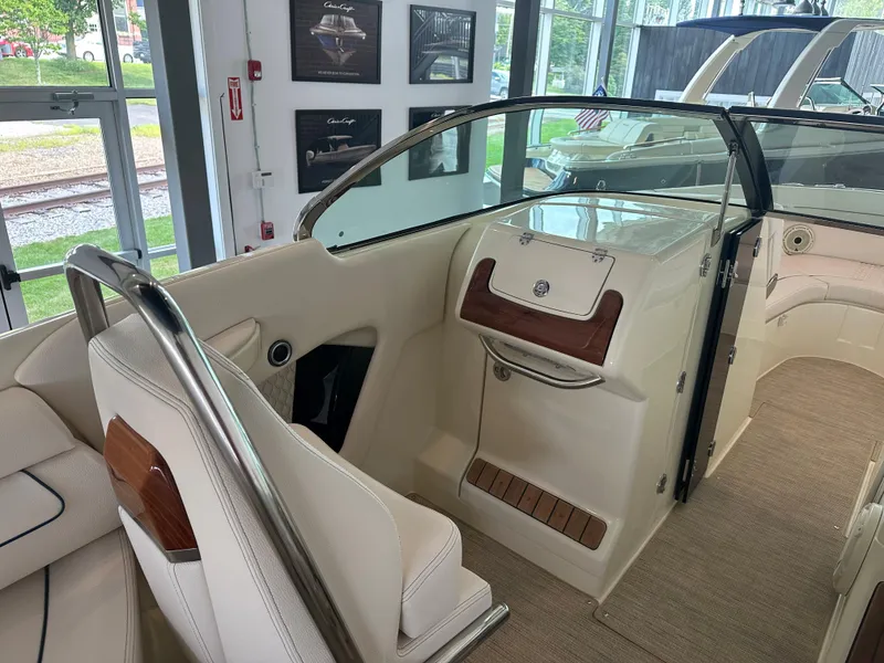 Slide: The Image of 2024 Chris-Craft Launch 28 GT interior with elegant seating and dashboard design. - 24
