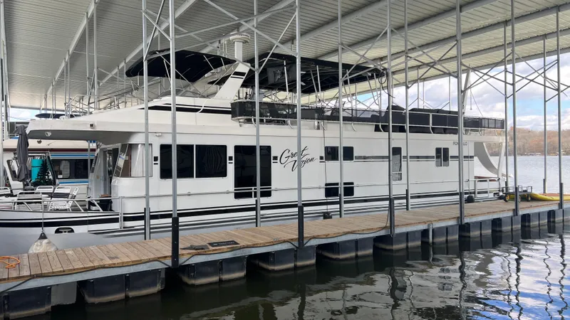 Slide: The Image of 2008 Monticello River Yacht docked under covered marina. - 2