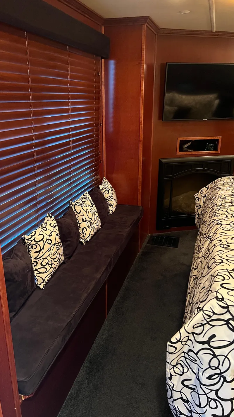 Slide: The Image of Luxurious 2008 Monticello River Yacht interior with cozy seating, elegant decor, and modern amenities. - 21