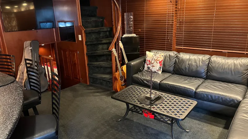 Slide: The Image of Luxurious 2008 Monticello River Yacht interior with leather seating and elegant decor. - 26