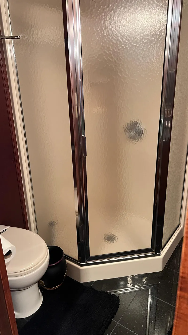 Slide: The Image of Compact bathroom with shower in 2008 Monticello River Yacht. - 36