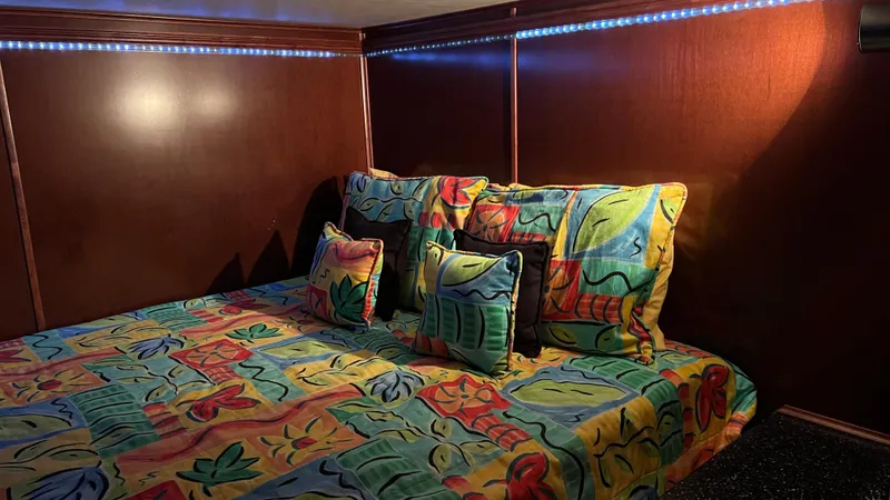 Slide: The Image of Colorful bedroom interior on 2008 Monticello River Yacht with vibrant bedding and LED lighting. - 46