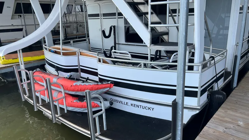 Slide: The Image of 2008 Monticello River Yacht with slide and kayaks, docked in Louisville, Kentucky. - 60