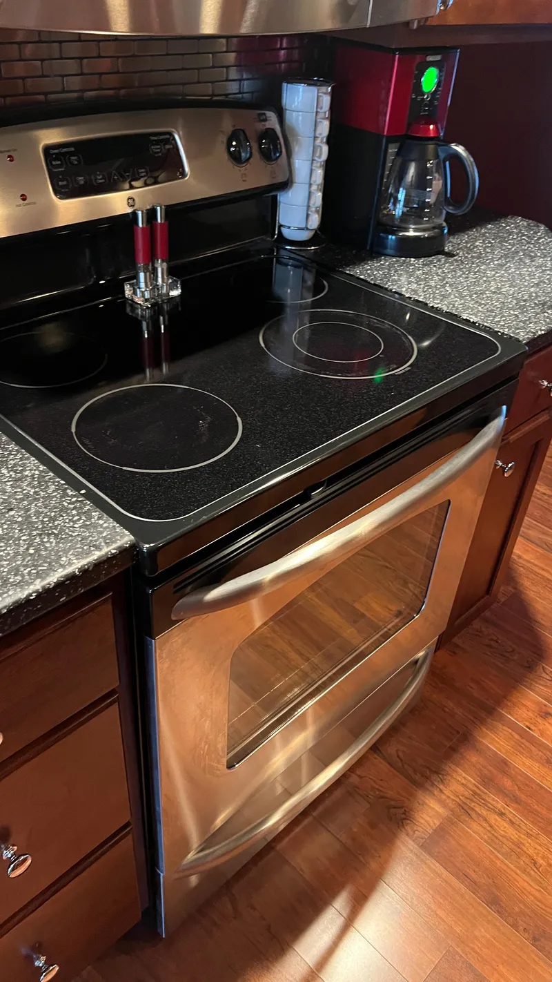 Slide: The Image of Modern kitchen with stainless steel stove and coffee maker on Monticello River Yacht, 2008. - 7