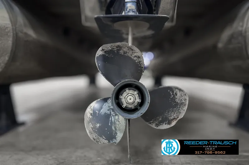 Slide: The Image of Close-up of a 2006 Crest Caribbean 2570 boat propeller with visible wear. - 39