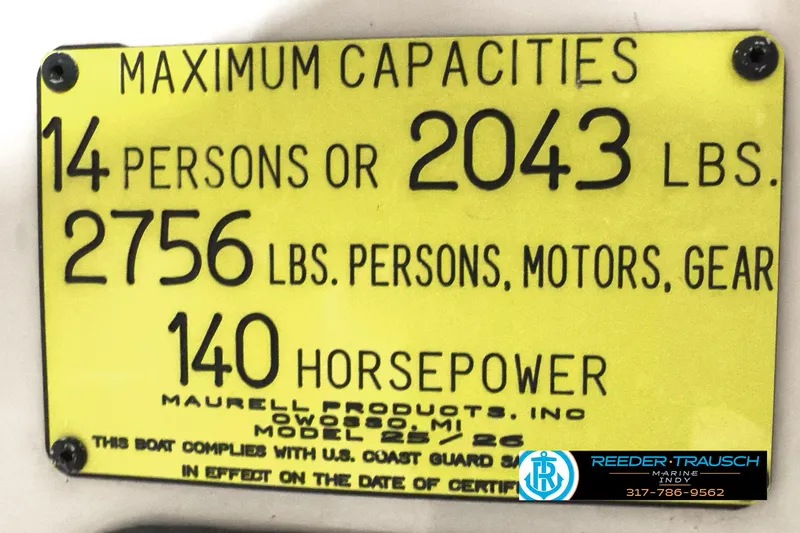 Slide: The Image of Capacity plate for 2006 Crest Caribbean 2570, 14 persons or 2043 lbs, 140 horsepower. - 43