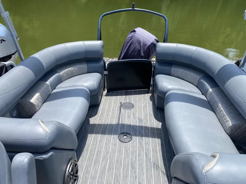 Slide: The Image of 2022 Premier 250 Grand Majestic RF pontoon boat interior with luxurious seating. - 6