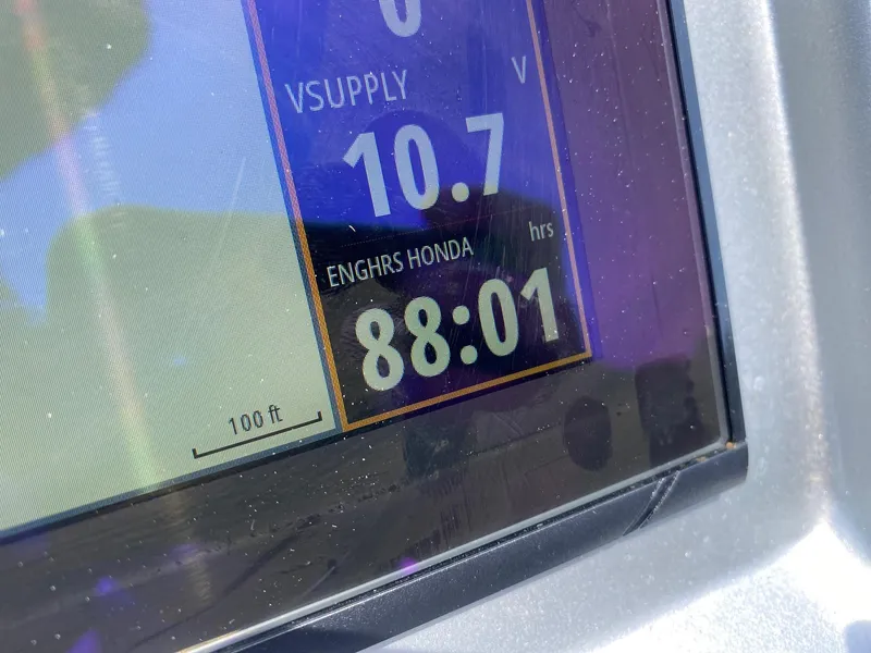 Slide: The Image of Dashboard display of a 2022 Premier 250 Grand Majestic RF showing 88 engine hours. - 8