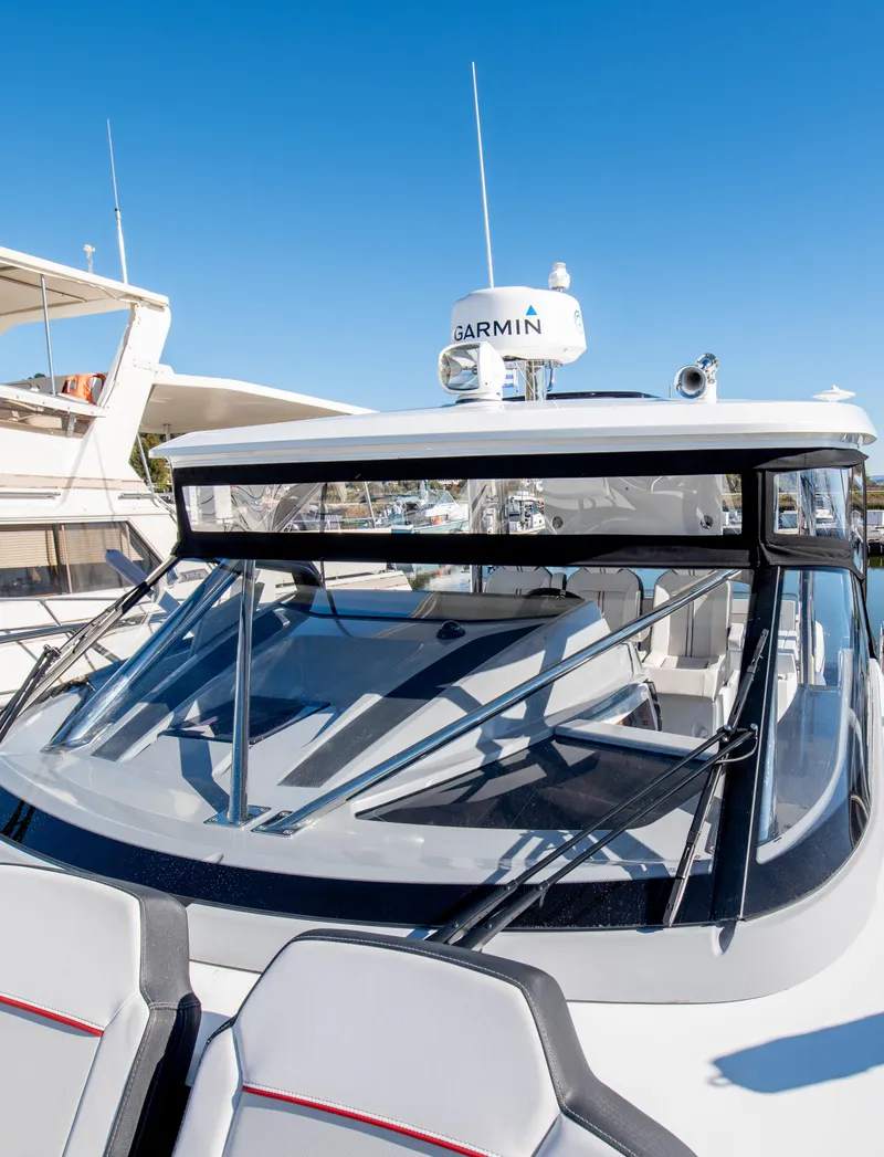 Slide: The Image of 2021 Jeanneau Leader 12.5 WA boat with sleek design and Garmin radar. - 16