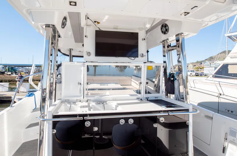 Slide: The Image of 2021 Jeanneau Leader 12.5 WA boat interior with modern amenities and sleek design. - 23