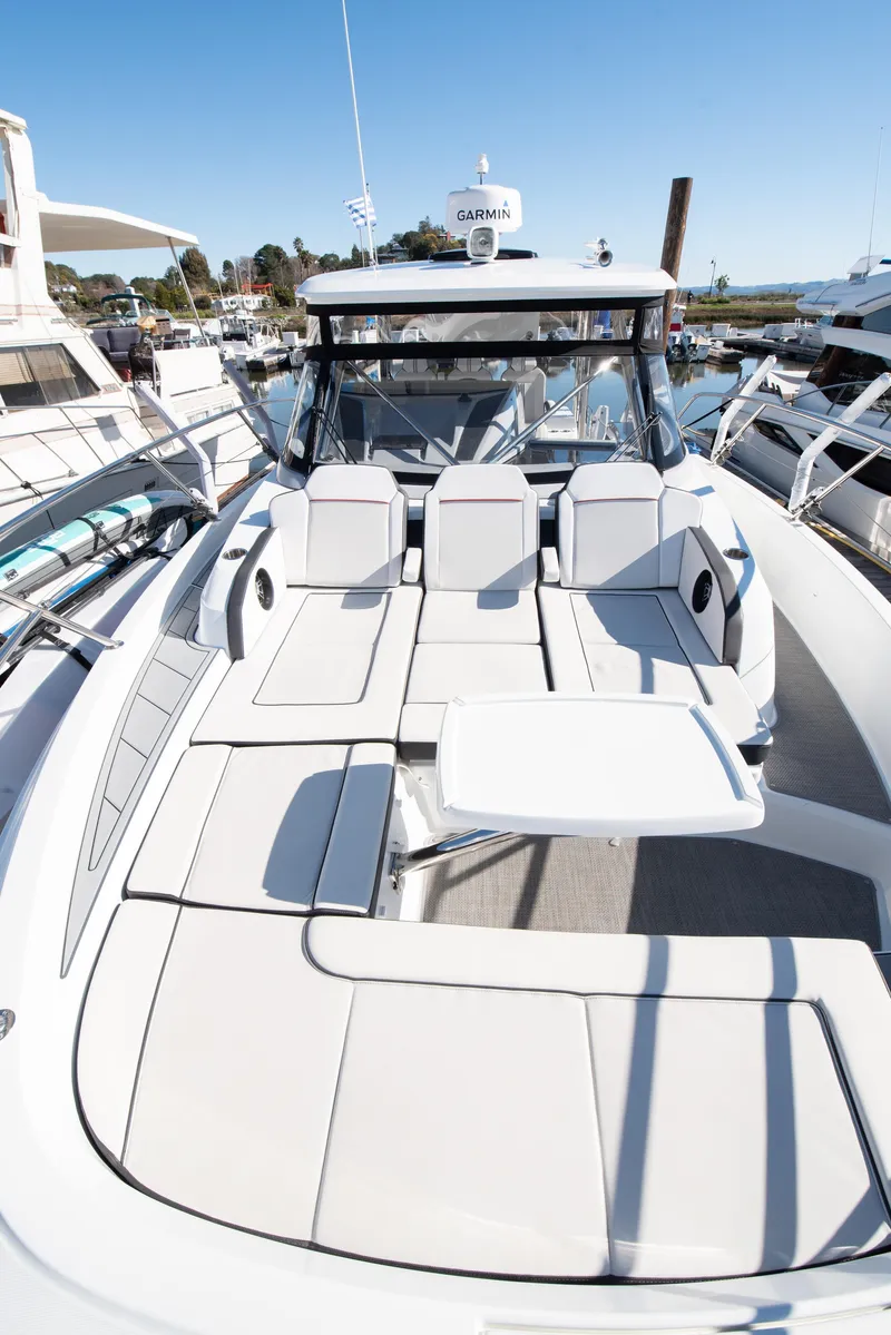 Slide: The Image of 2021 Jeanneau Leader 12.5 WA boat with spacious deck and seating area. - 40