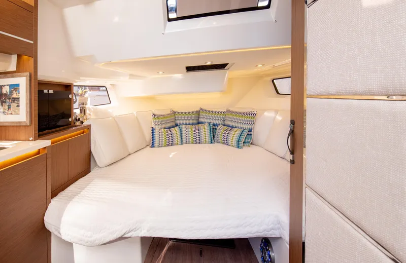 Slide: The Image of Luxurious cabin interior of 2021 Jeanneau Leader 12.5 WA with cozy bedding and modern design. - 47