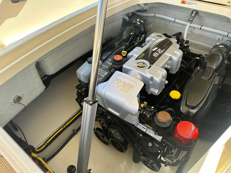 Slide: The Image of 2023 Chris-Craft Launch 28 GT engine compartment, showcasing powerful marine engine. - 22
