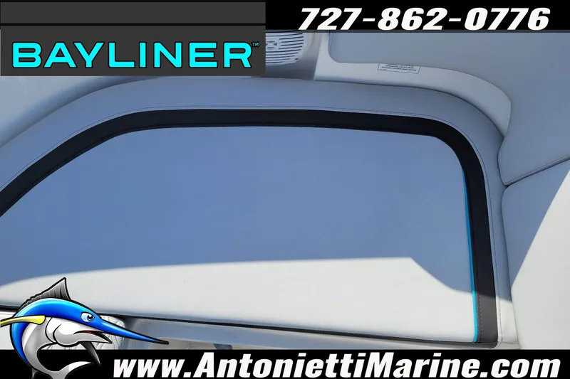 Slide: The Image of 2025 Bayliner Element M17 boat interior with logo and contact details. - 23