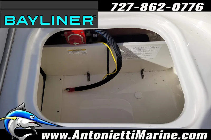 Slide: The Image of 2025 Bayliner Element M17 battery compartment with wiring and safety instructions. - 32