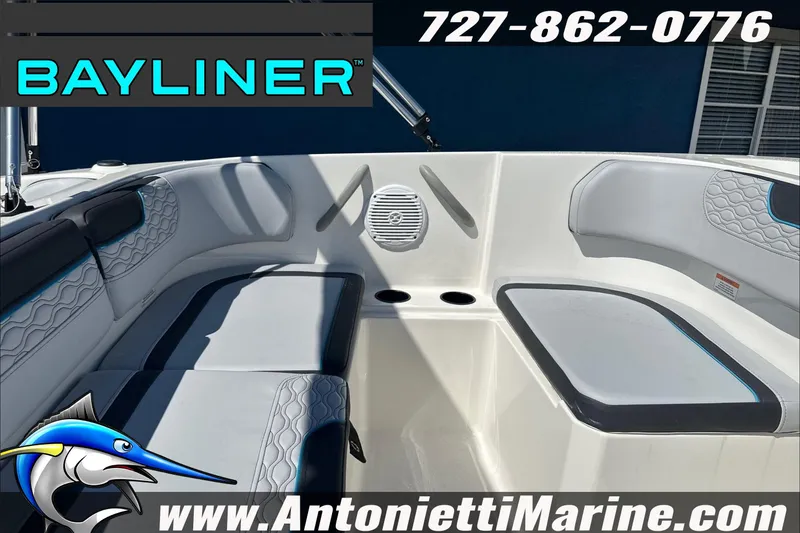 Slide: The Image of 2025 Bayliner Element M17 boat interior with seating, logo, and contact details. - 46
