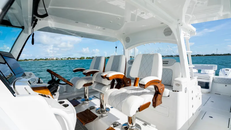Slide: The Image of Luxurious interior of 2021 HCB 53 Sueños boat with plush seating and ocean view. - 12