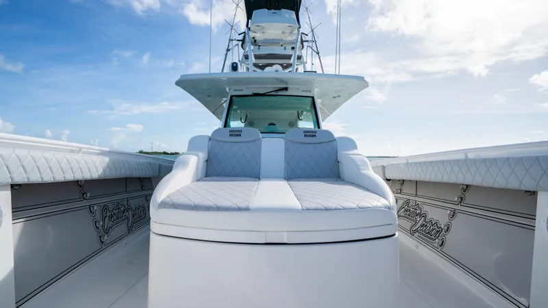 Slide: The Image of Luxurious 2021 HCB 53 Sueños boat interior with plush seating and elegant design. - 20