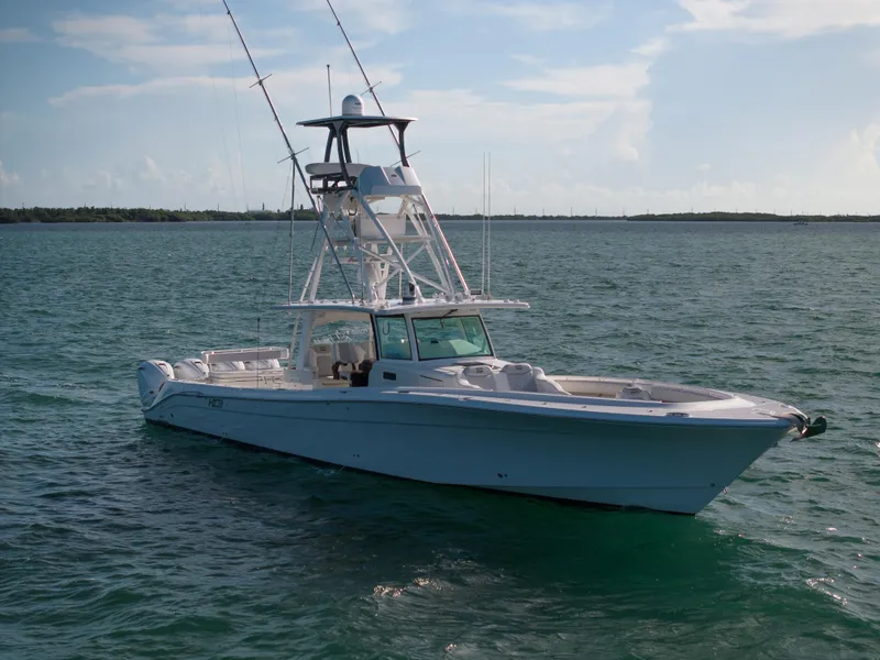 Slide: The Image of 2021 HCB 53 Sueños boat on calm ocean waters under a clear sky. - 28